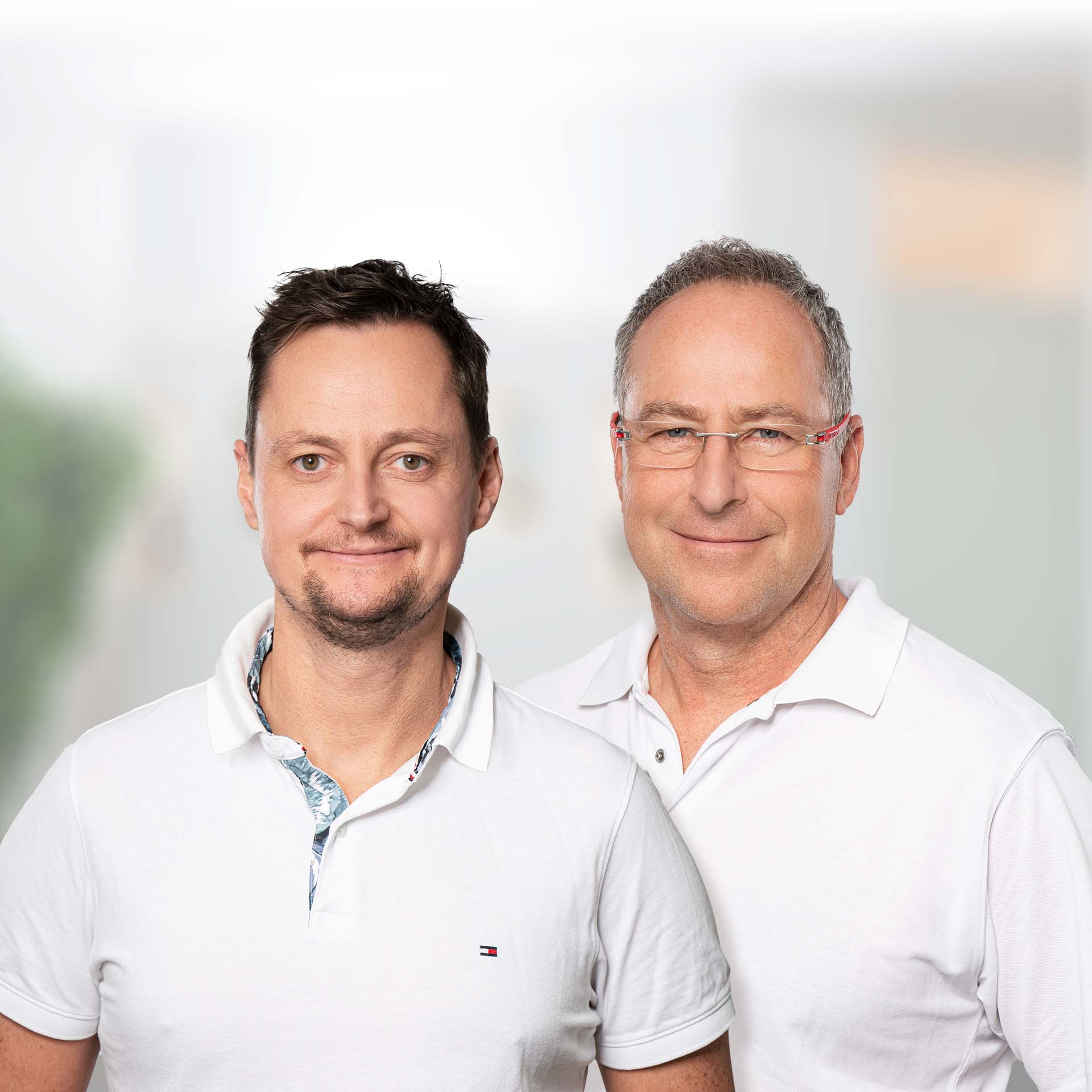 Portrait von Dr. Philip Hüppe und Dr. Tobias Schuster